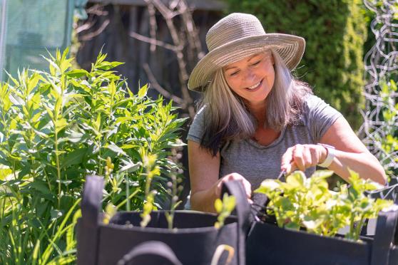 A woman gardening outside